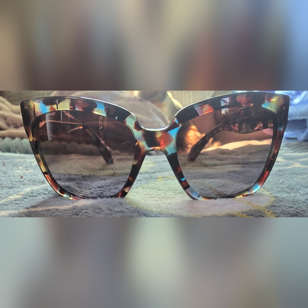 Prada Tortoiseshell Sunglasses with Blue Accents